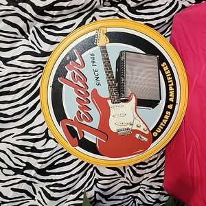 Fender Round Metal Sign Excellent Condition. Perfect gift for a Music Lover !